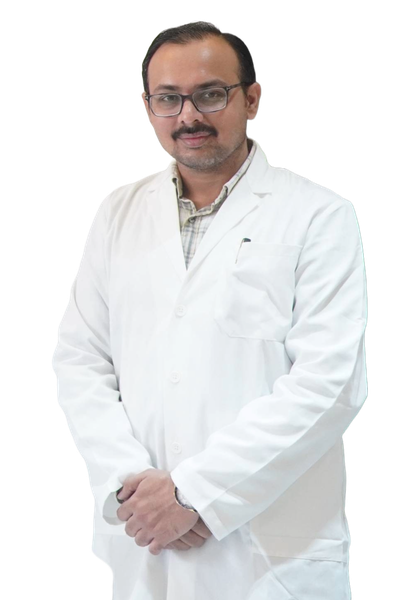 Dr. Jaydipsinh B. Bhati wearing a white coat and glasses.